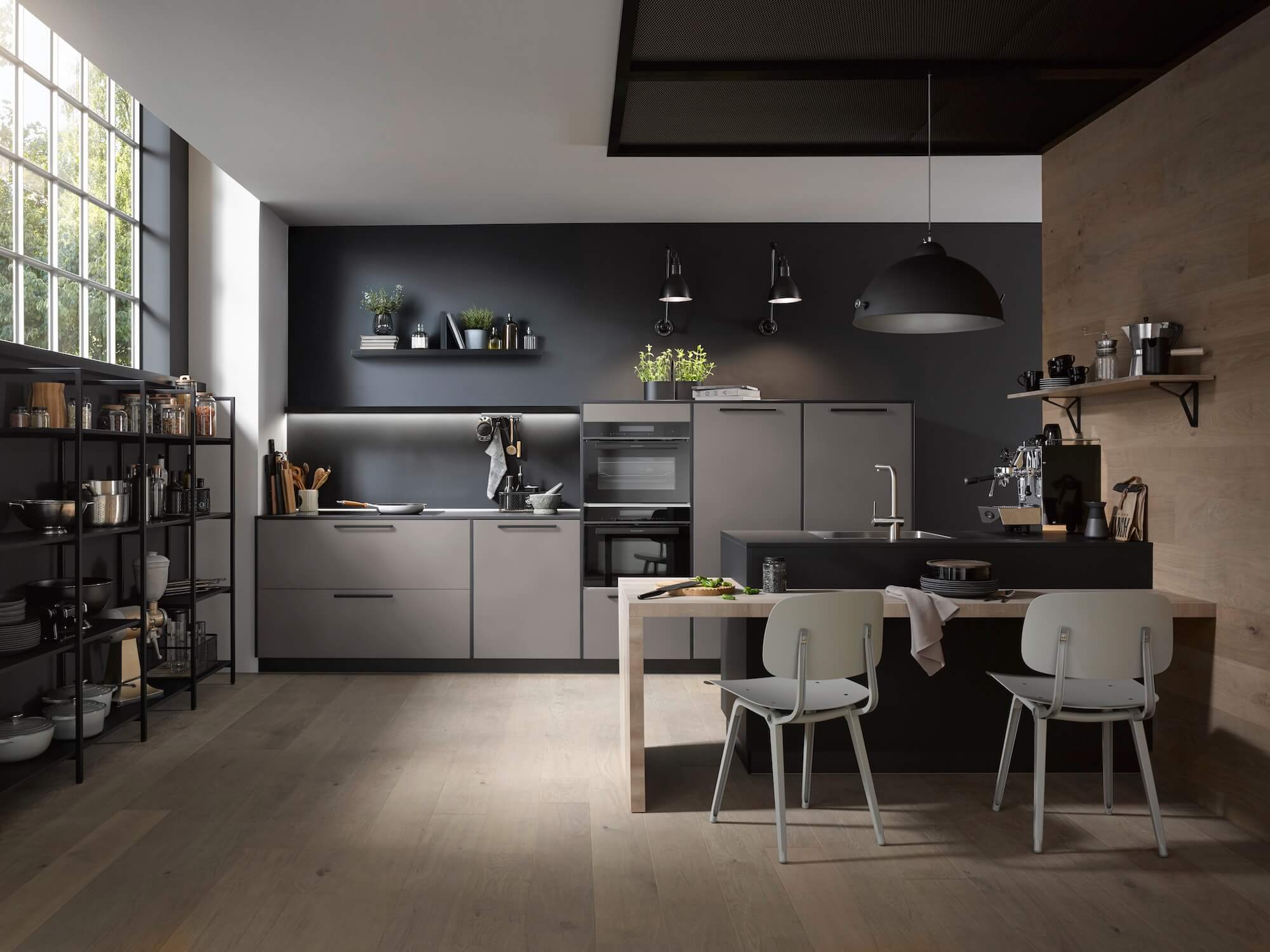 Häcker Designküche mit Halbinsel Grau